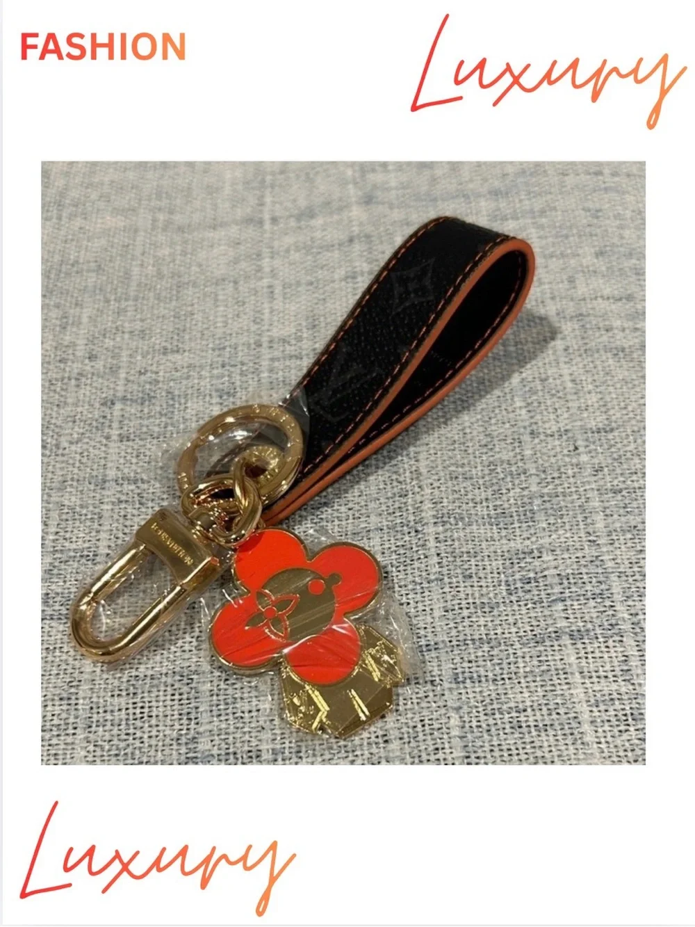 KEYCHAIN BAG CHARM WRISTLET: Gold & Orange Floral Figure w/Brown Leather Strap